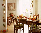 Interior with autumnal decoration on wooden table