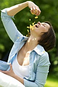 Woman with cornflakes radiating health and well-being