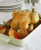 Roast chicken in garlic and herb stock