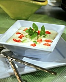 Chilled cucumber soup with pieces of pepper