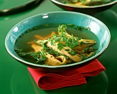 Clear poultry broth with lemon grass and chicken