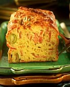 Savoury loaf cake with ham and olives