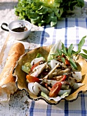 Vegetable salad with tapenade (olive dressing)