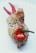 Belly pork roulades stuffed with chili peppers, for grilling