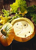 Pumpkin soup served in a hollowed-out pumpkin