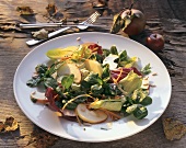 Mixed salad leaves with apples