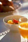 Breakfast: orange juice, fruit and baked goods