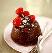 Christmas pudding with raspberries