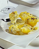 Pasta shell gratin with pineapple and sauerkraut filling