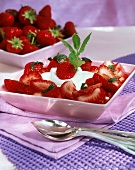 Fresh strawberries with yoghurt and mint