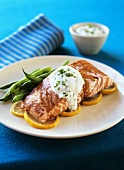 Steamed salmon fillet on lemon slices