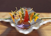 Skewered vegetables with deep-fried noodles