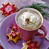 Hot chocolate with star-shaped biscuits