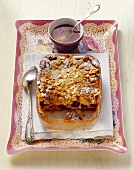 Cherry pudding with flaked almonds