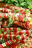 Raw lamb and beef kebabs with peppers