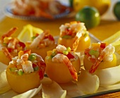 Yellow tomatoes stuffed with shrimps and peppers