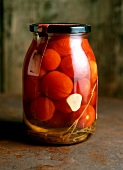 Jar of bottled tomatoes