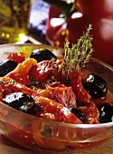 Grilled peppers with olives and herbs