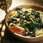 Middle Eastern spinach with prunes and tomatoes