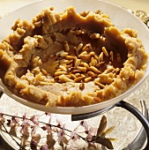 Helva (dessert with pine nuts)