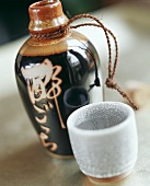 Sake in bottle and sake cup