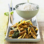 Pork with bamboo shoots and spinach