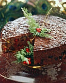 Chocolate cake with fruit, a piece cut