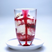 Bavarian cream with raspberry sauce in glass