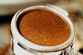 Espresso powder in filter holder (close-up)