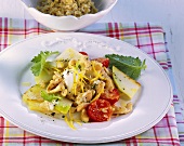 Strips of chicken with vegetables and lemon sauce