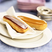 Two éclairs on plate