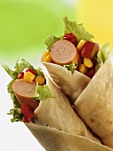 Sausage wraps with sweetcorn and peppers