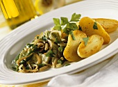 Fried potatoes with green beans, artichokes, pine nuts