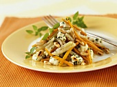 Kohlrabi and carrots with mozzarella and pine nuts