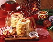 Round butter biscuits in jars with Christmas decoration