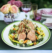 Lamb cutlets on spring vegetables