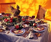 Rustic table with autumn leaves and fruits