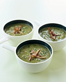 Three bowls of parsley soup and ham
