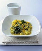 Chick-pea and broad bean dhal with caraway potatoes