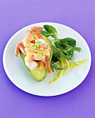 Shrimps in an avocado half with green salad