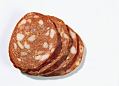 Cooked paprika salami, in slices
