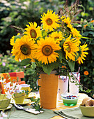 Sunflowers, millet and ivy