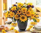 Sunflowers, Rudbeckia 'Goldsturm' and globe thistles