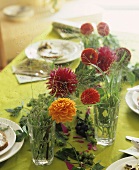 Table decoration of Zinnias, dill and hops