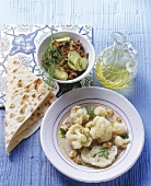 Courgettes with mince, cauliflower with walnut sauce (Turkey)