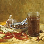 Spicy Chinese sauce (Sha-Cha sauce) in jar and bowl