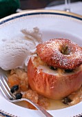 Baked Apple Stuffed with Apricots and Raisins; Vanilla Ice Cream; Powdered Sugar