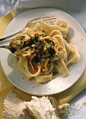 Fettuccine (ribbon pasta) with rabbit ragout & olives