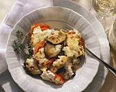 Rice casserole with tomatoes, aubergines & sheep's cheese