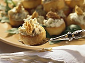 Baked pastry cases with Stilton mousse and walnuts